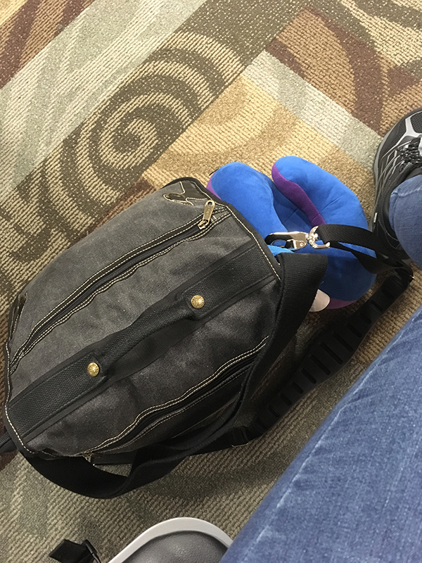 Image of my shoulder bag sitting next to me at the airport
