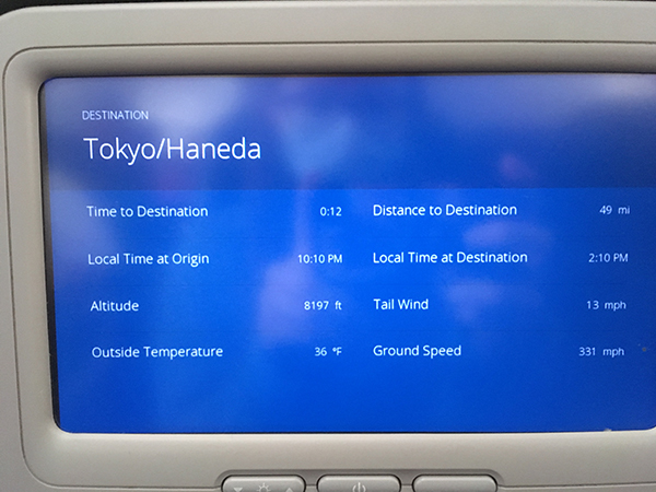 Image of the flight tracker showing 12 minutes until we would reach our destination